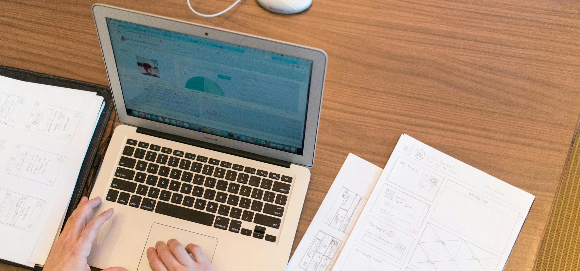 Person's Hands on Top of Macbook Air