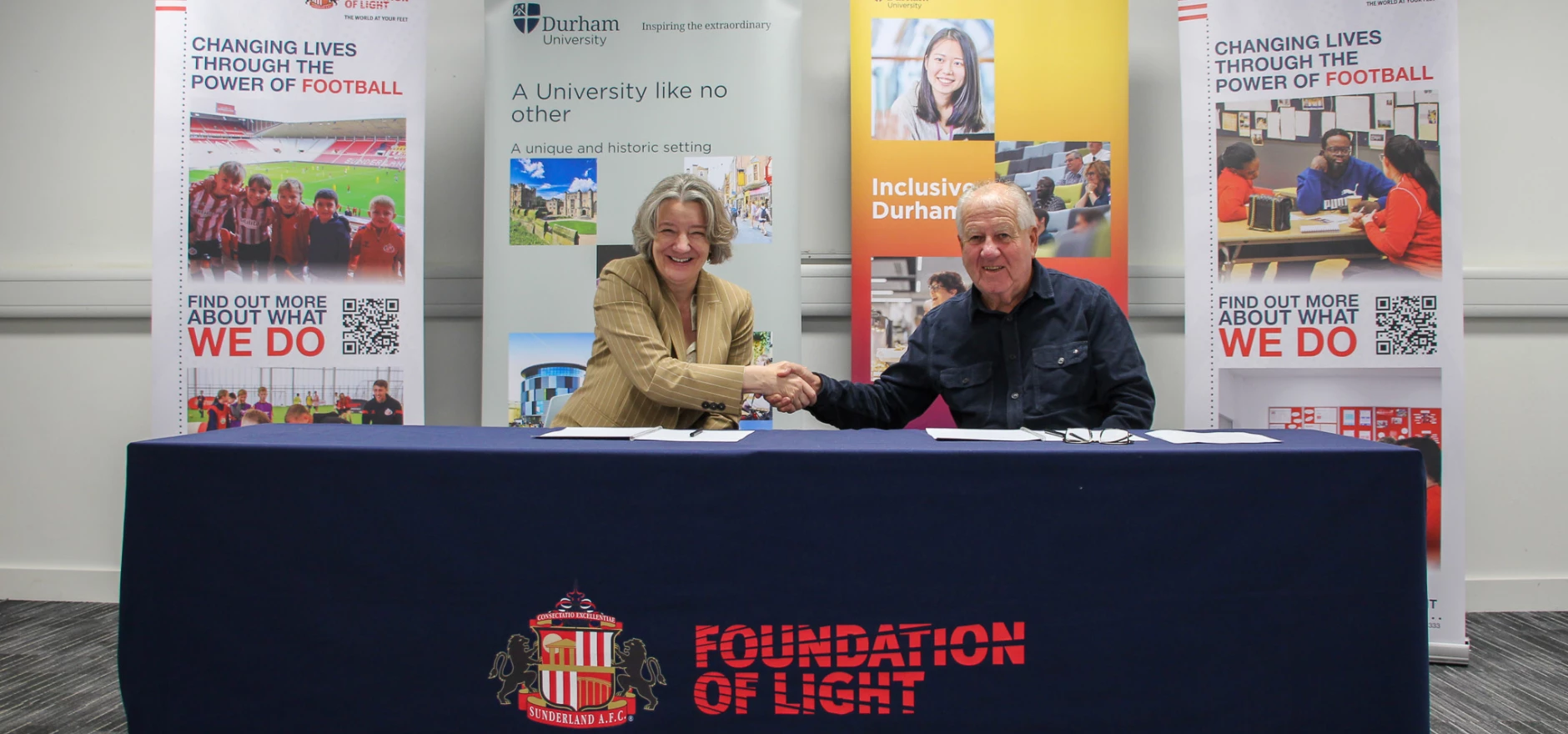 Professor Karen O’Brien from Durham University and Sir Bob Murray Foundation of Light Chairman sign MOU at Beacon of Light.jpg