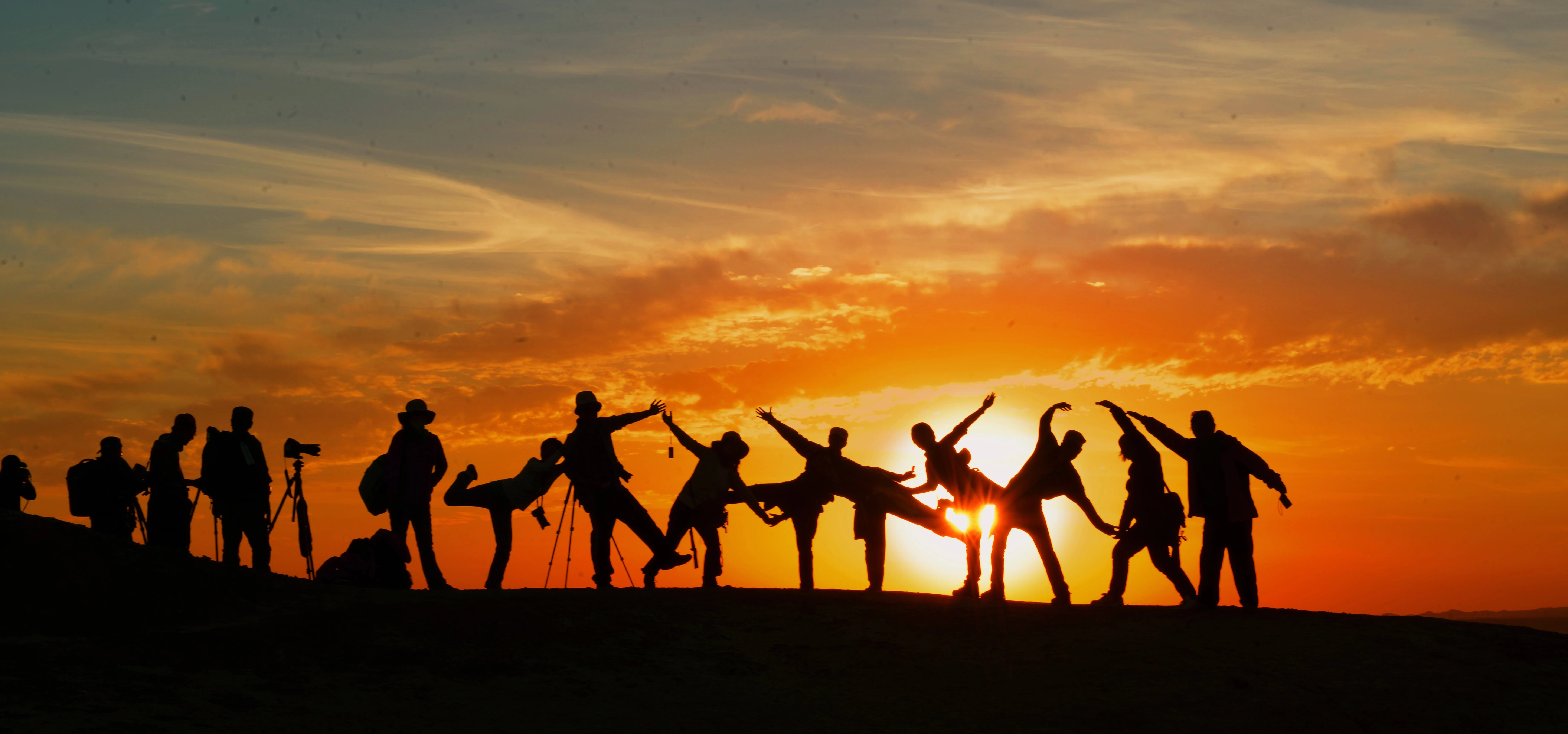 Silhouette of People during Golden Hour