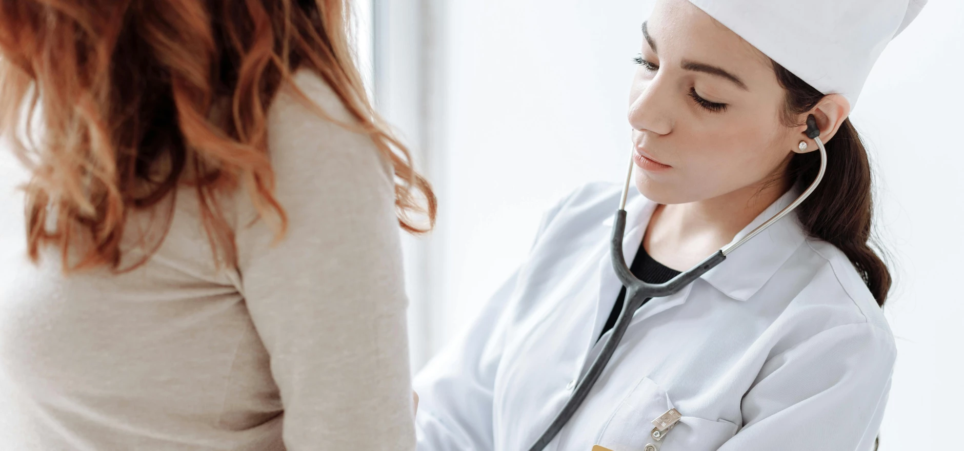 Photo Of Doctor Checking On Her Patient