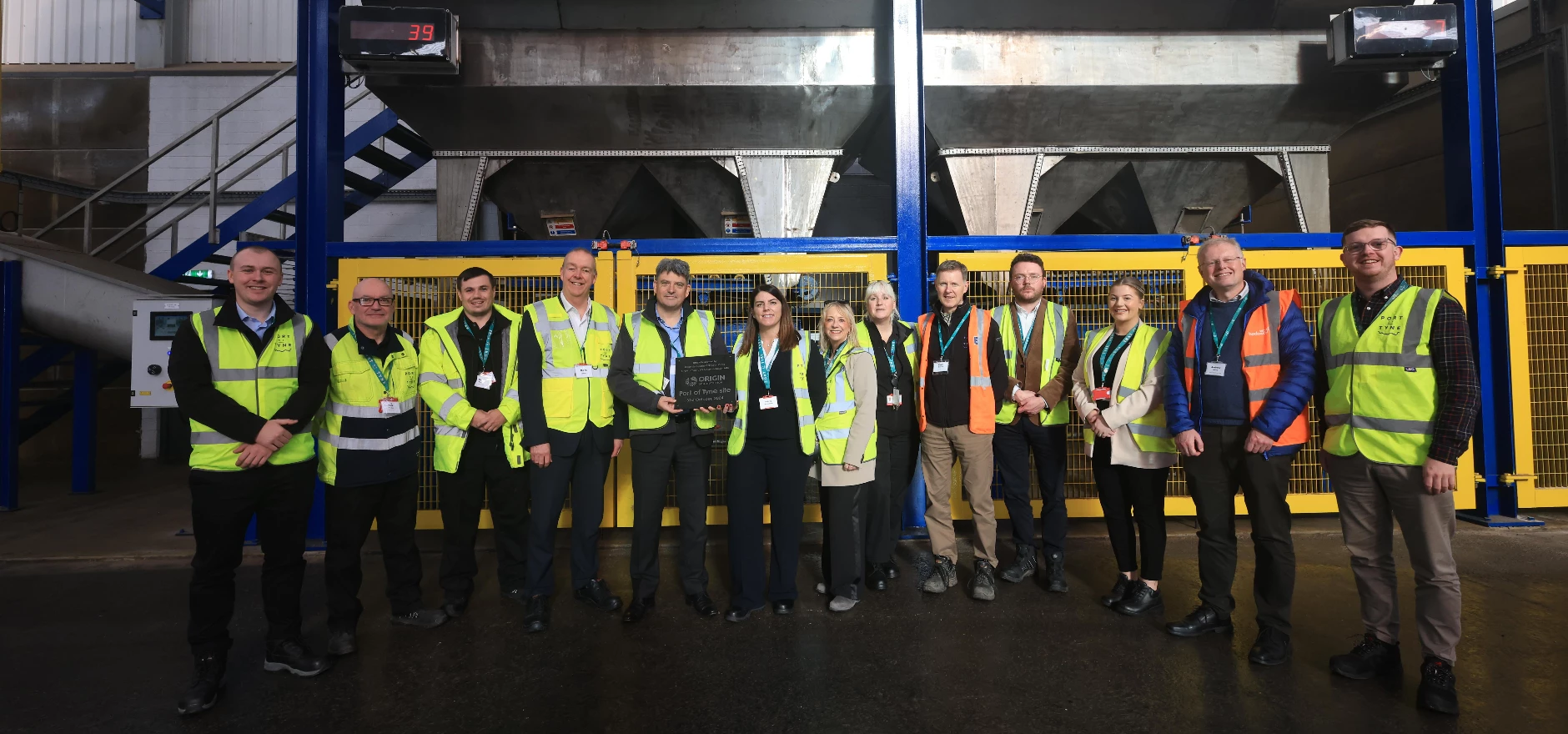 Ashley Nicholson, Chief Business Officer Port of Tyne and Sean Coyle, CEO, Origin Enterprises alongside employees from Port of Tyne and Origin Soil Nutrition (3)-min.JPG